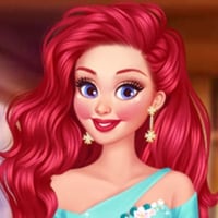 Princess Ariel in a new, blue gown with sparkles