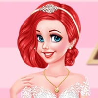 Redhead Disney Princess Ariel in a wedding gown and jewelry