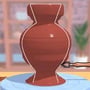 Clay vase spinning on the potter's wheel