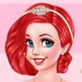 Redhead Disney Princess Ariel in a wedding gown and jewelry